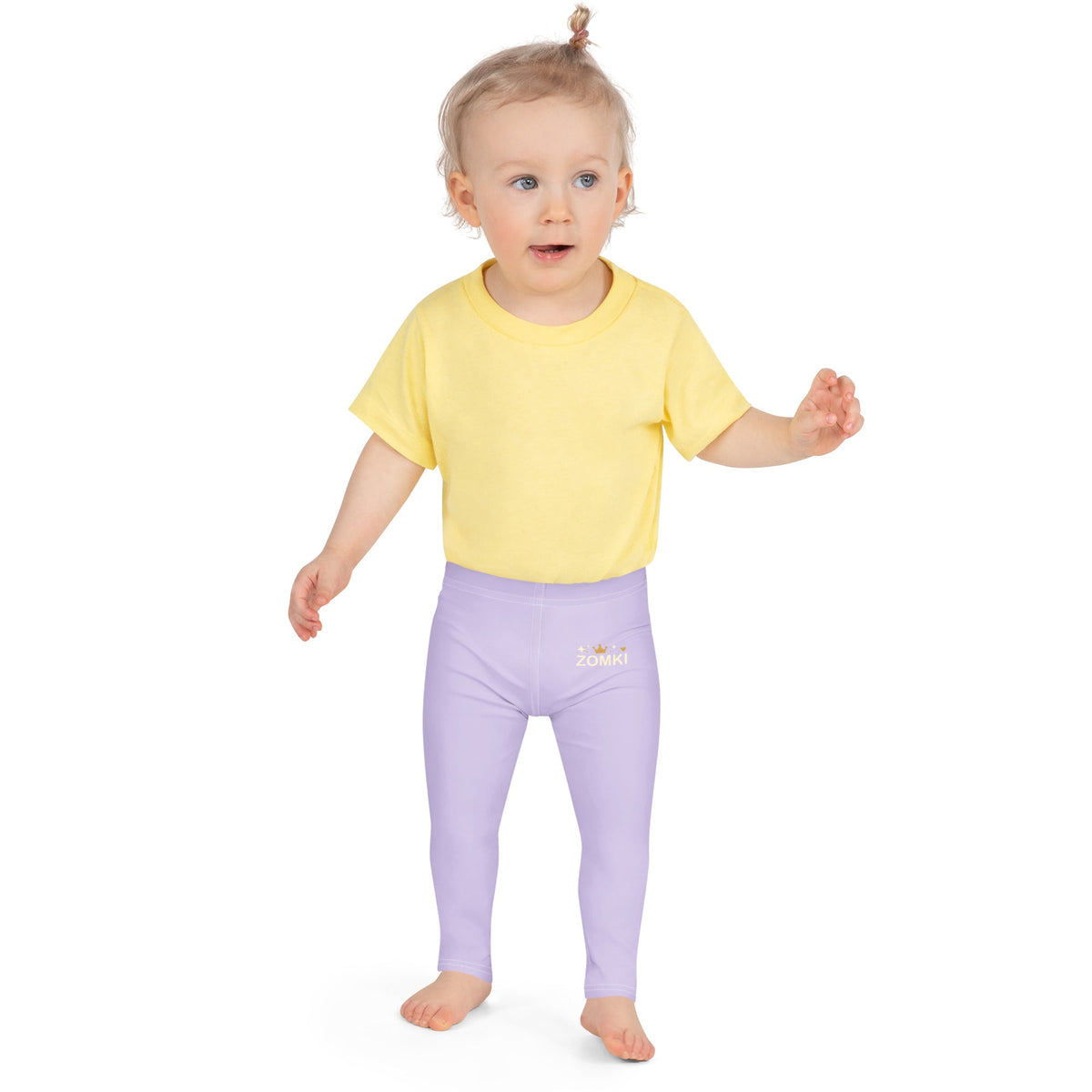 Maqueta frontal del proveedor: leggings infantiles lavanda con estampado ZOMKI crema y dorado y constelación de estrellas sobre el muslo izquierdo.