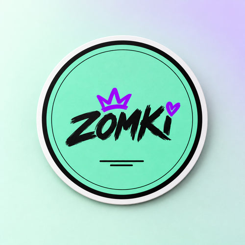 Imán magnético redondo ZOMKI Crown Mint de 10 cm, solo, con fondo menta y luz de estudio. Acabado mate, corona y corazón violeta.